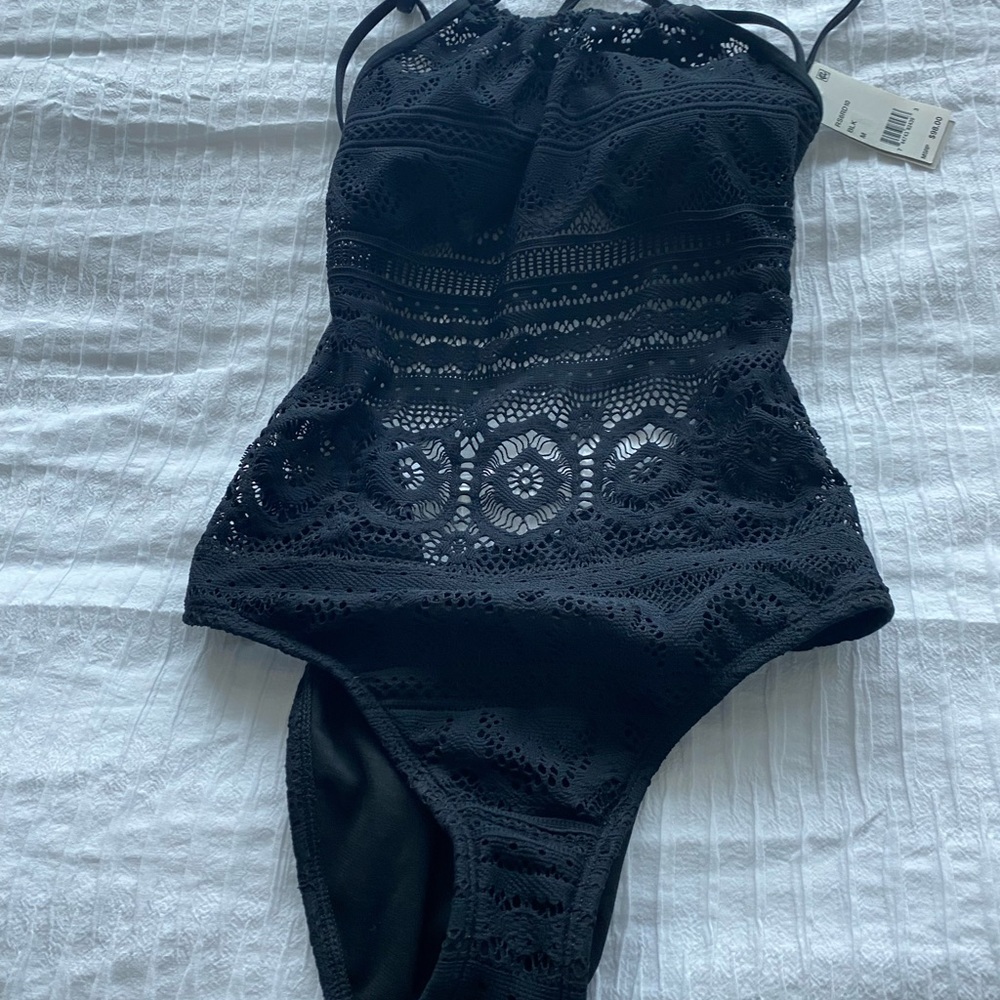 Black, medium Kenneth Cole one piece bathing suit brand new tag still on